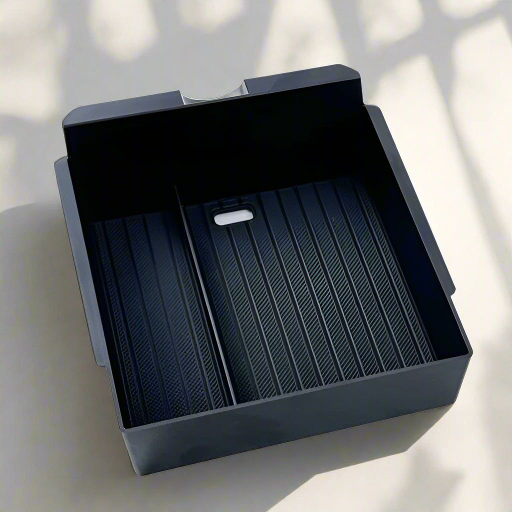 Black plastic tray with textured surface